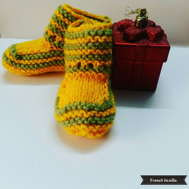 Green-yellow baby booties