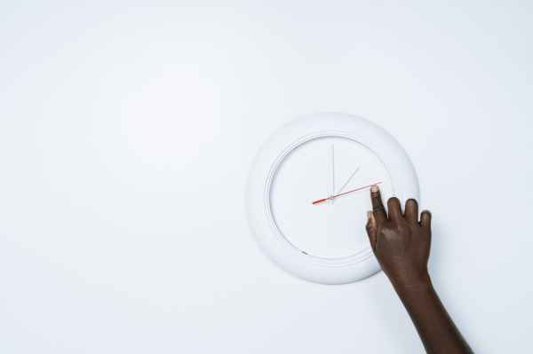 pointing on a arm of a clock